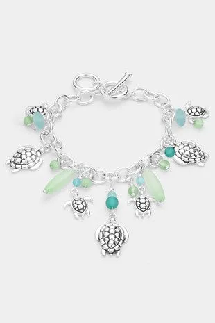 Turtle Station Charm Bracelet with Toggle Closure
